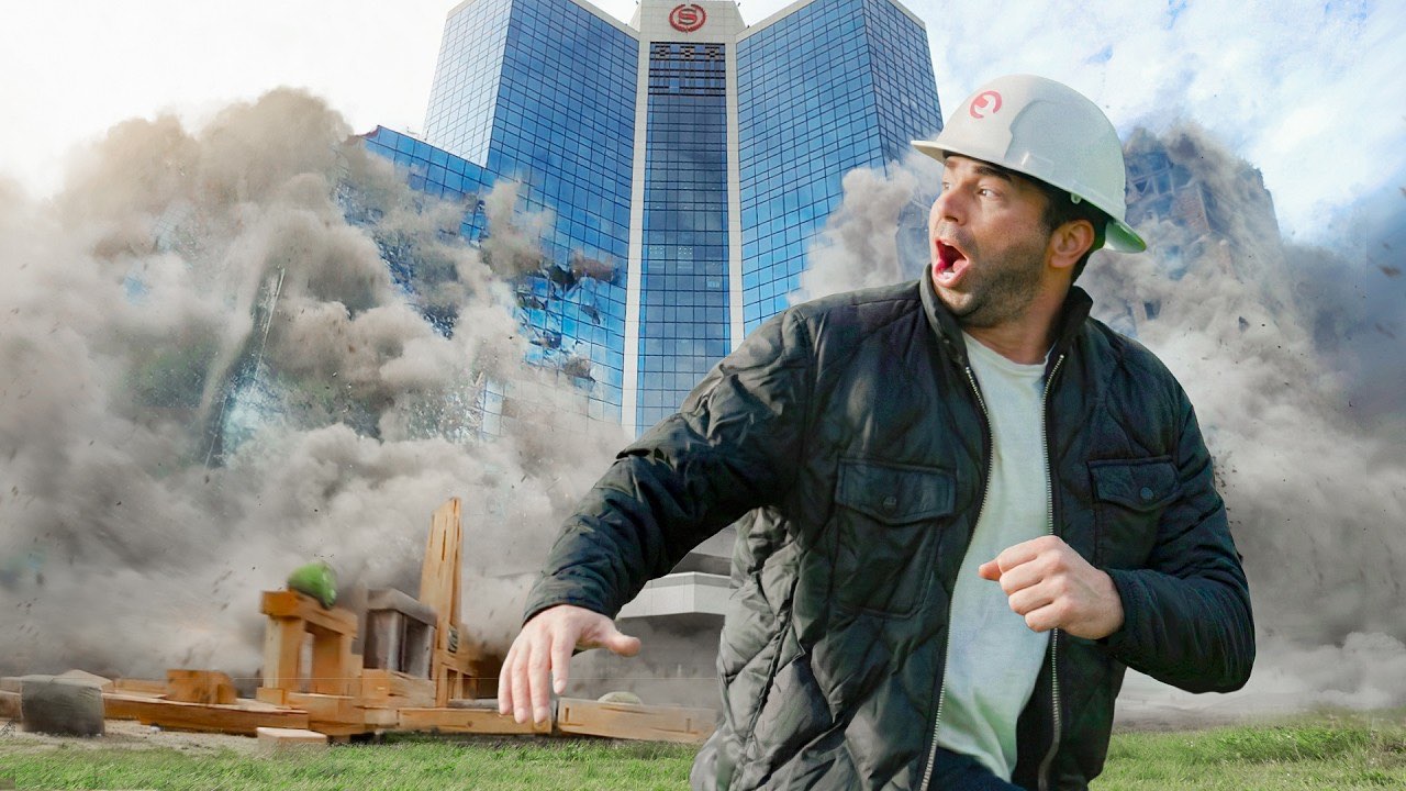 Mark Rober's "I Blew Up A 24 Story Building" thumbnail, Rober in a hard hat reacting with open-mouthed awe as a building collapses behind him